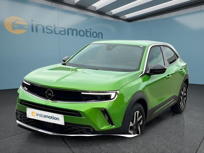 Grün Gebraucht 2023 Opel Mokka-e Elegance SUV | 19.349 € (Guter Preis) - Bild 1/4