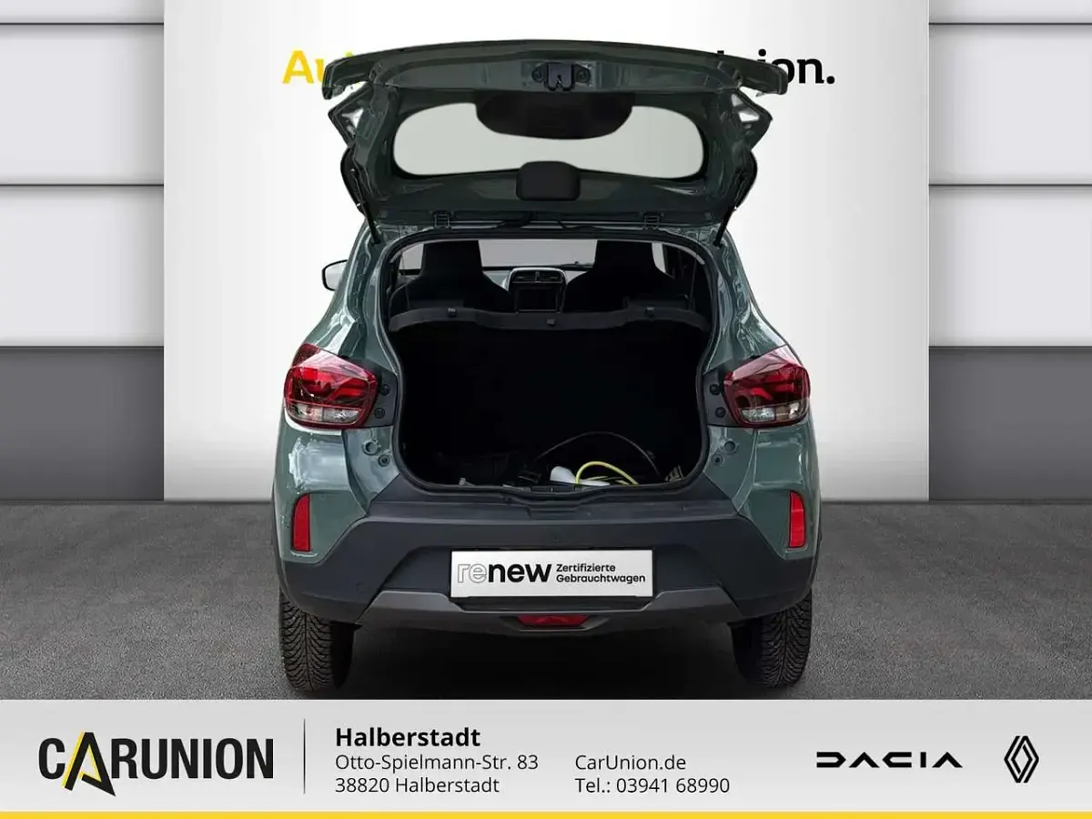 Gebraucht Dacia Spring Essentiel 33 kW (45 PS) 2023 Olivgrau Kleinwagen