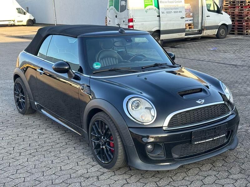 Schwarz Gebraucht 2012 Mini John Cooper Works Cabriolet Cabrio | 8.950 € (Fairer Preis) - Bild 1/4