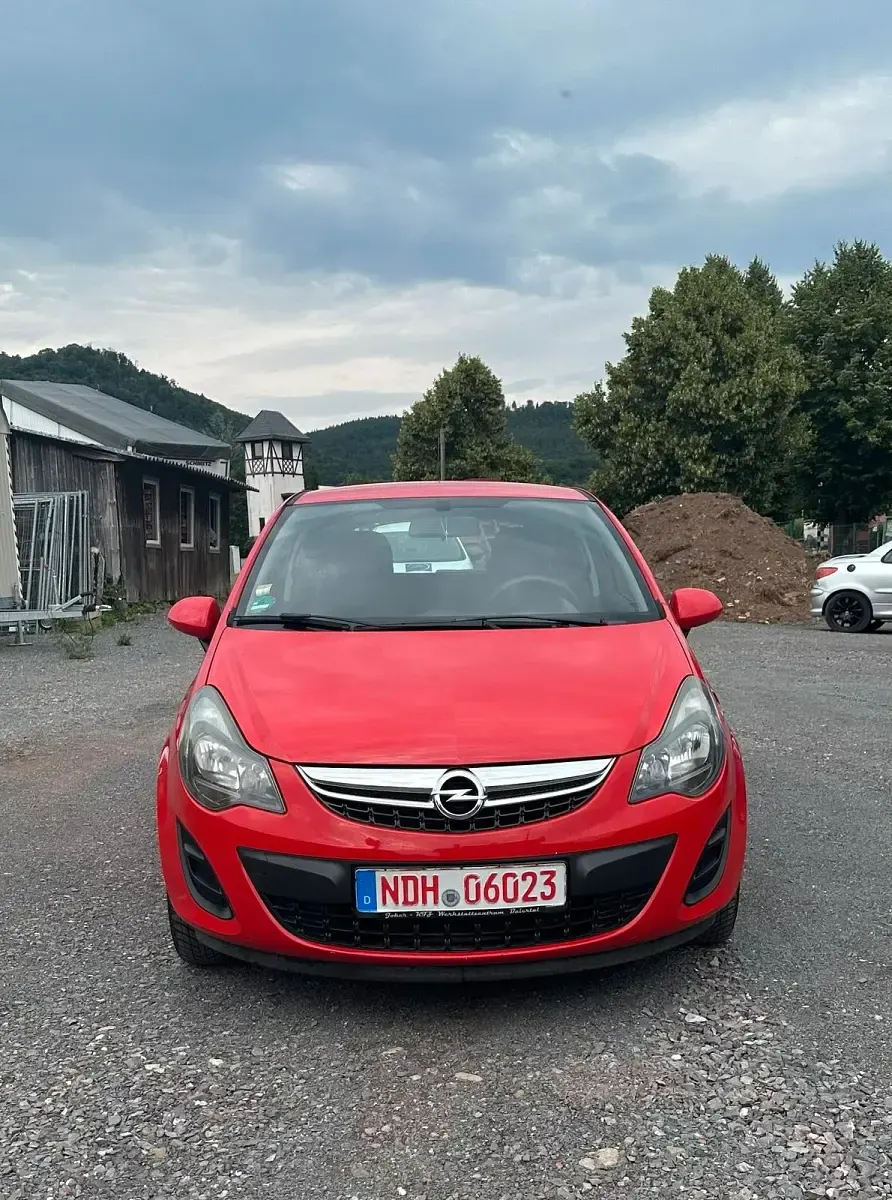 Gebraucht Opel Corsa Selection 69 PS (50 kW) 2014 Rot Kleinwagen