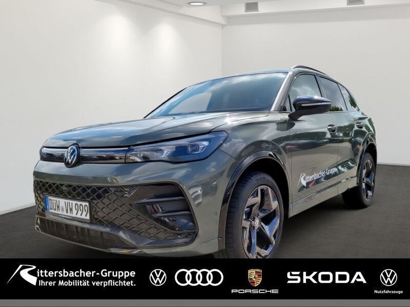 Cipressinogrün metallic Gebraucht 2025 VW Tiguan R-line SUV | 54.900 € (Fairer Preis) - Bild 1/4