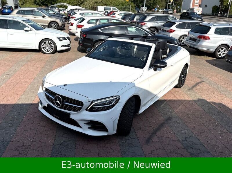 Polarweiss unilack (metallic) Gebraucht 2019 Mercedes C220 AMG Cabrio | 30.690 € (Fairer Preis) - Bild 1/4
