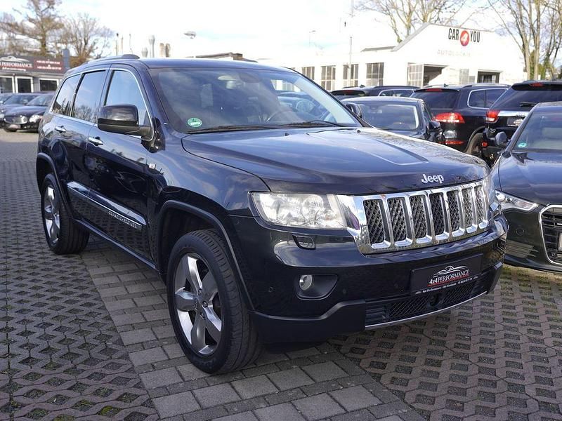 Grau Gebraucht 2012 Jeep Grand Cherokee Overland SUV | 16.995 € (Teuer) - Bild 1/4