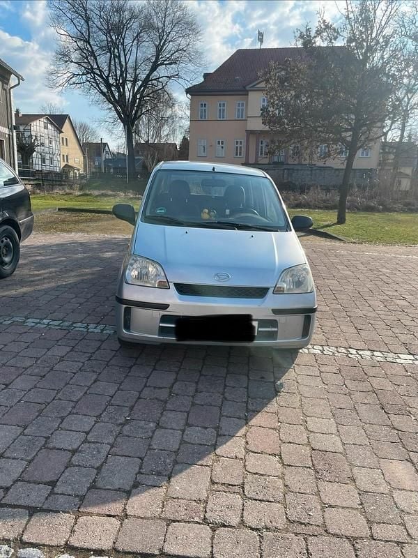 Gebraucht Daihatsu Cuore 58 PS (42 kW) 2003 Silber Kleinwagen