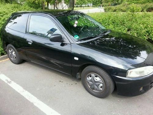 Gebraucht Mitsubishi Colt 75 PS (55 kW) 1998 Schwarz Limousine