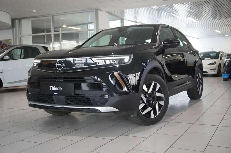 Gebraucht Opel Mokka-e Elegance 100 kW (136 PS) 2022 Diamant schwarz metallic SUV