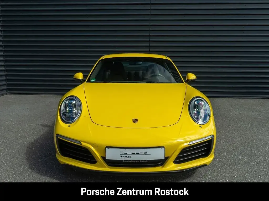 Gebraucht Porsche 911 Carrera 370 PS (272 kW) 2017 Racinggelb Coupé
