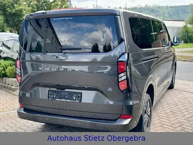 Gebraucht Ford Tourneo 170 PS (125 kW) 2024 Grau (magneticgrau (metallic)) Van / Kleinbus