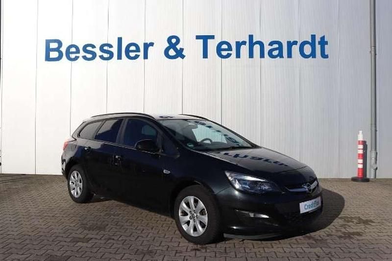 Karbonschw graphitschw midnigh Gebraucht 2015 Opel Astra Style Kombi | 7.990 € (Fairer Preis) - Bild 1/4