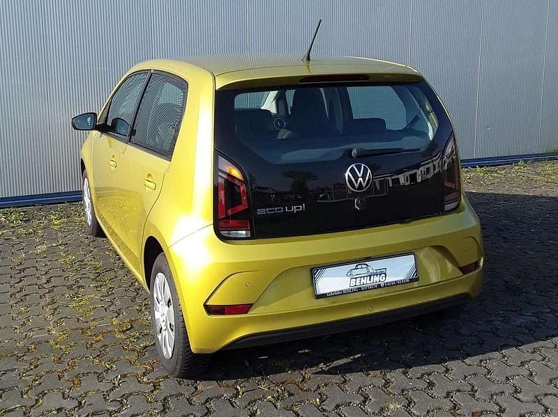 Gebraucht VW up! 68 PS (50 kW) 2021 G8  honey yellow Kleinwagen