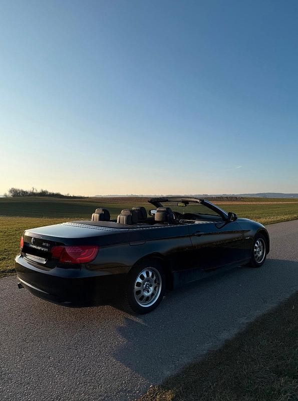 Gebraucht BMW 318 Cabriolet 143 PS (105 kW) 2011 Schwarz Cabrio