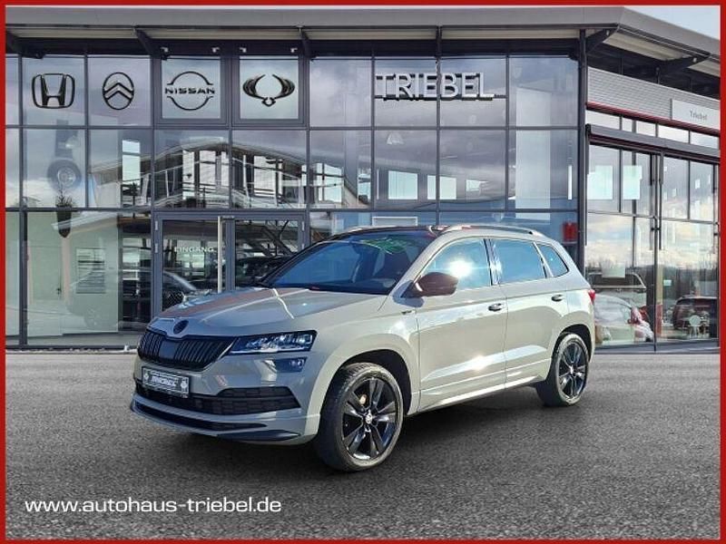 Grau Gebraucht 2019 Skoda Karoq SportLine SUV | 20.580 € (Guter Preis) - Bild 1/4