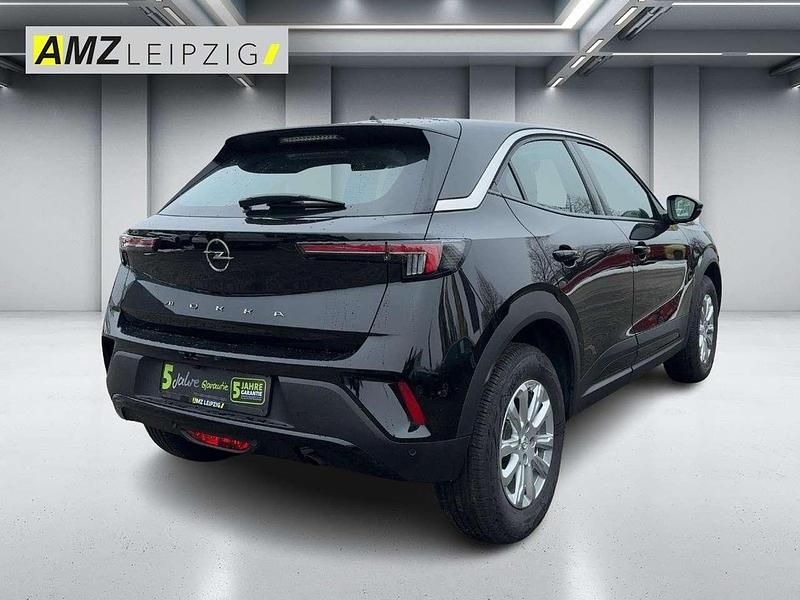 Gebraucht Opel Mokka Enjoy 101 PS (74 kW) 2023 Lackierung schwarz perla nera/ SUV