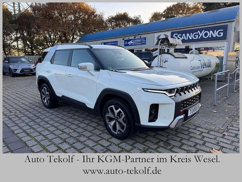 Grand white waa Gebraucht 2024 Ssangyong (KGM) Torres Quartz SUV | 27.850 € (Fairer Preis) - Bild 1/4