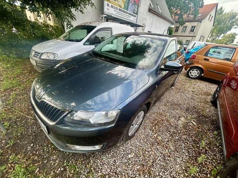 Metalgrau (metallic) Gebraucht 2014 Skoda Rapid Ambition Kombi | 7.490 € (Fairer Preis) - Bild 1/4