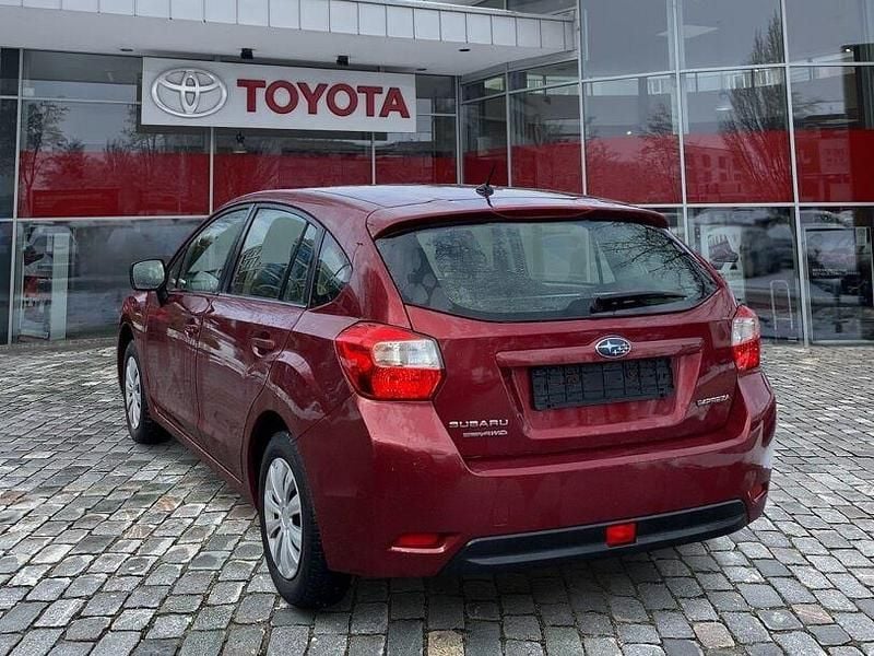 Gebraucht Subaru Impreza Comfort 114 PS (83 kW) 2014 Venetian red (p) Limousine