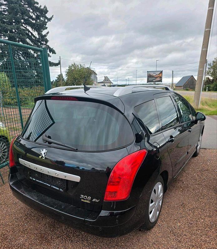 Gebraucht Peugeot 308 111 PS (81 kW) 2011 Schwarz Kombi