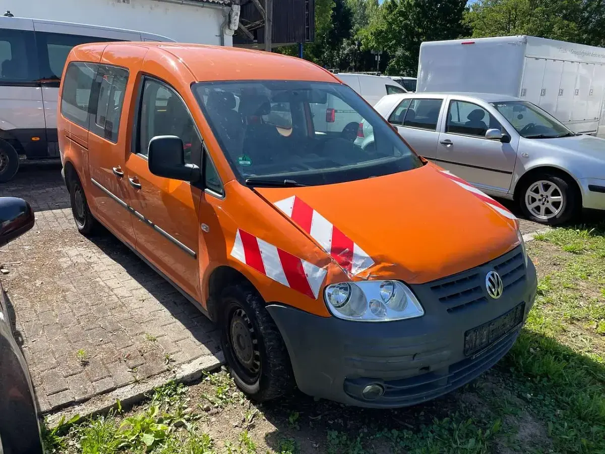 Gebraucht VW Caddy 105 PS (77 kW) 2009 Leuchtorange Van / Kleinbus