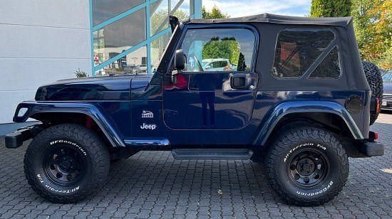Blau (metallic) Gebraucht 2006 Jeep Wrangler Sahara SUV | 25.500 € (Teuer) - Bild 1/4