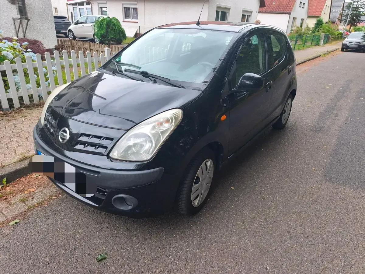 Gebraucht Nissan Pixo Acenta 68 PS (50 kW) 2009 Schwarz Kleinwagen