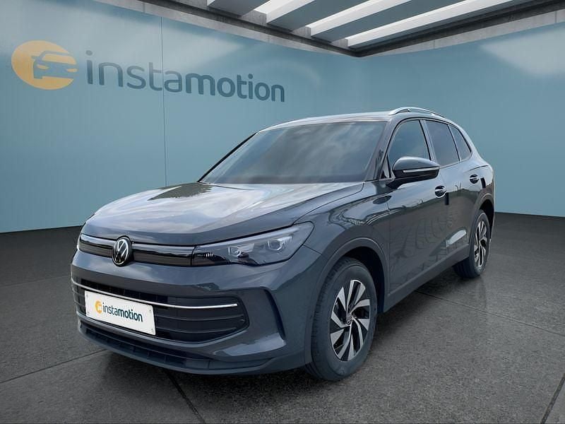Grau Gebraucht 2024 VW Tiguan SUV | 42.449 € (Guter Preis) - Bild 1/4