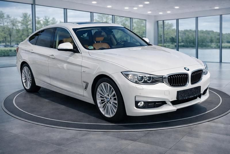 Weiß Gebraucht 2014 BMW 330 Gran Turismo Luxury Line Limousine | 12.900 € - Bild 1/4