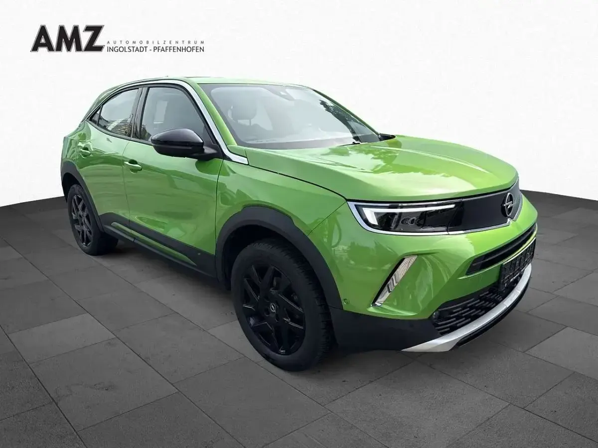 Gebraucht Opel Mokka Elegance 136 PS (100 kW) 2023 Lackierung matcha green/typ au SUV