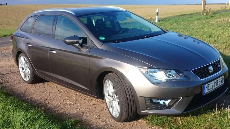 Grau Gebraucht 2014 Seat Leon ST Kombi | 13.999 € (Teuer) - Bild 1/4