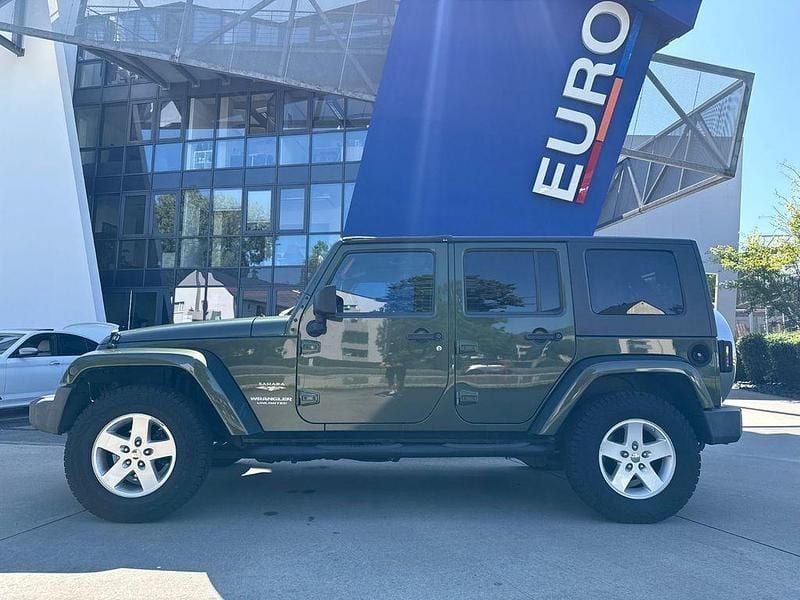 Grün Gebraucht 2009 Jeep Wrangler Unlimited Sahara SUV | 12.900 € (Superpreis) - Bild 1/4