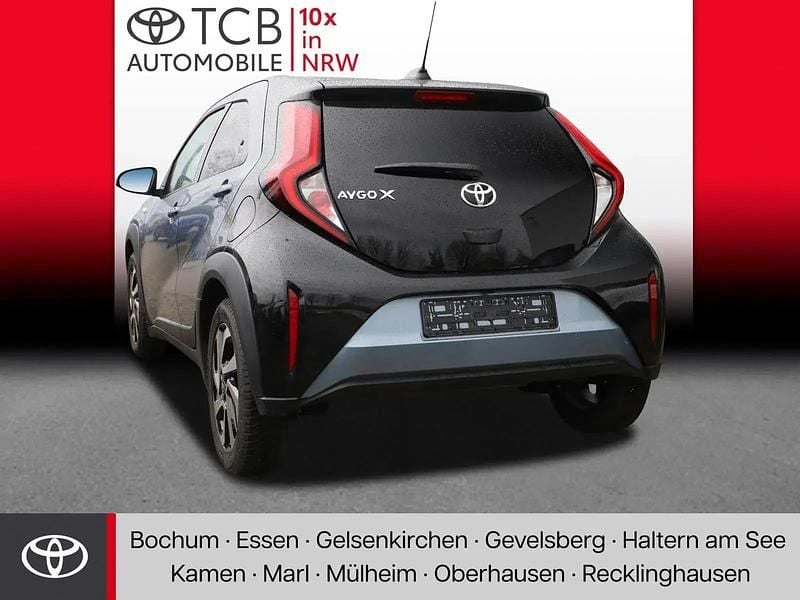 Gebraucht Toyota Aygo X Basis 72 PS (52 kW) 2025 Celestite grey metallic / night sky black SUV