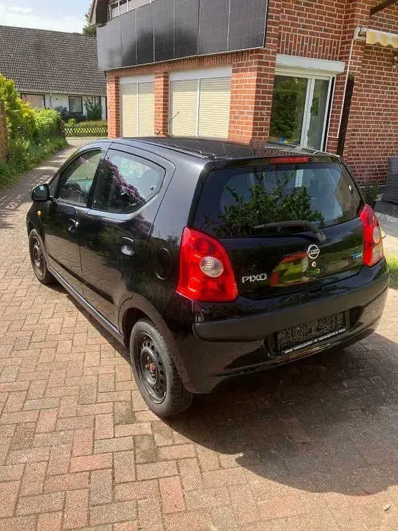 Gebraucht Nissan Pixo Acenta 68 PS (50 kW) 2009 Schwarz Kleinwagen