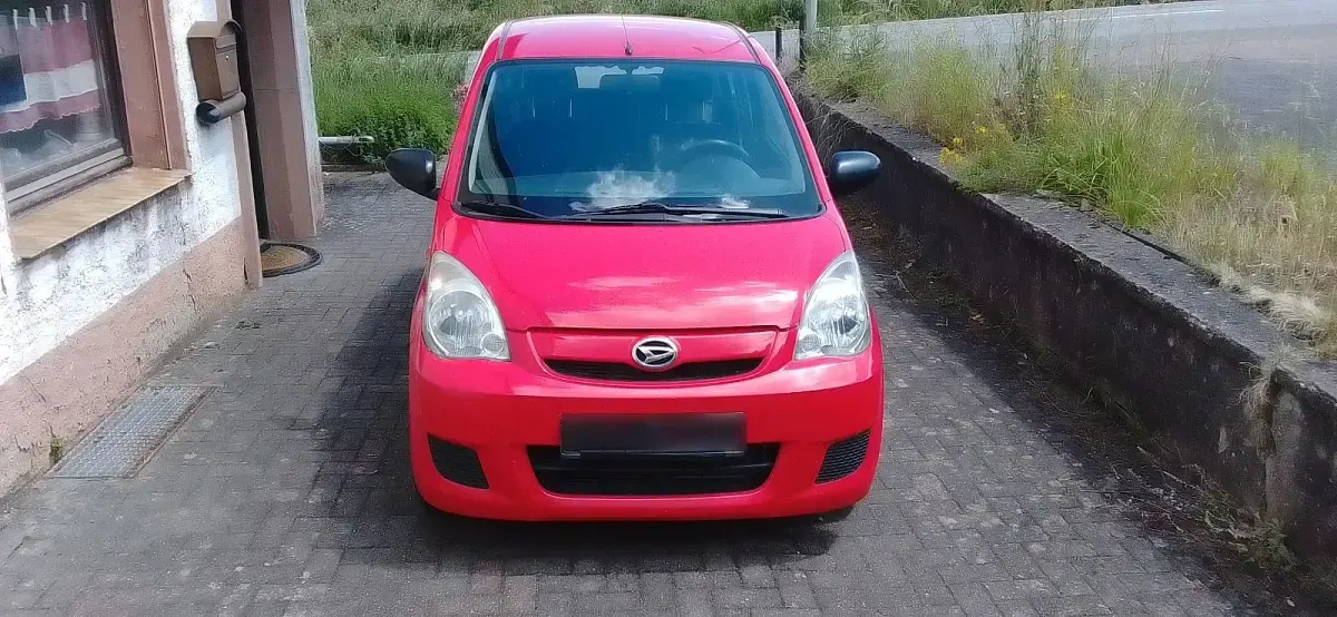 Gebraucht Daihatsu Cuore 69 PS (50 kW) 2007 Rot Kleinwagen