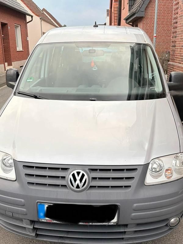 Gebraucht VW Caddy 77 PS (56 kW) 2010 Silber Van / Kleinbus