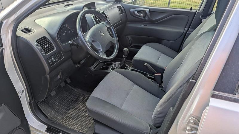 Gebraucht Mitsubishi Space Star 98 PS (72 kW) 2003 Silber Kombi