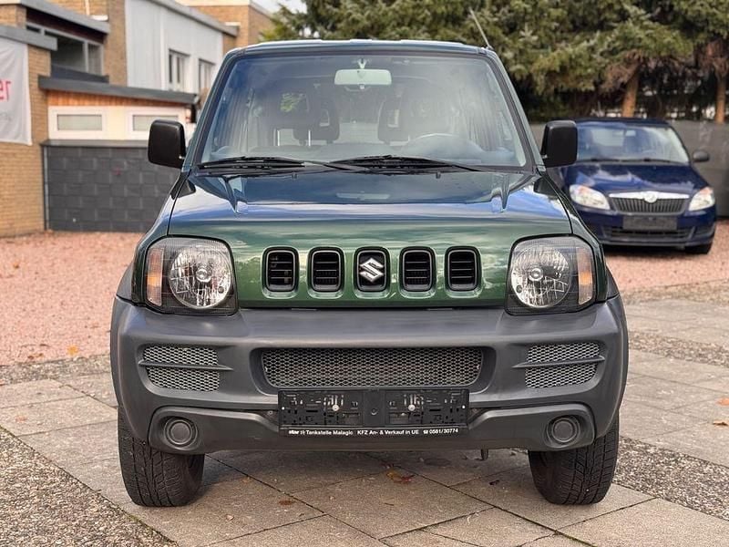 Grün Gebraucht 2012 Suzuki Jimny SUV | 7.900 € (Superpreis) - Bild 1/4
