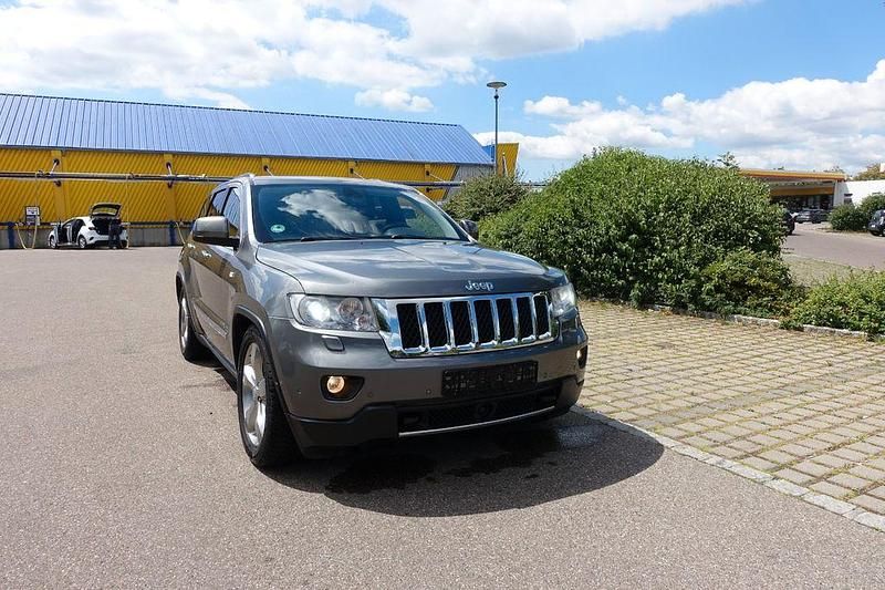 Grau Gebraucht 2011 Jeep Grand Cherokee Overland SUV | 7.990 € (Superpreis) - Bild 1/4