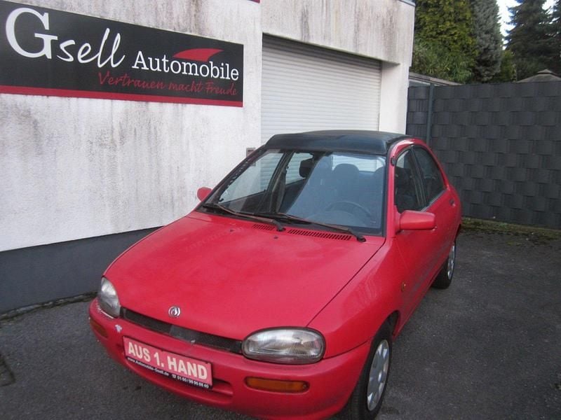 Second-hand Mazda 121 72 CP (52 kW) 1995 Roșu Berlinǎ