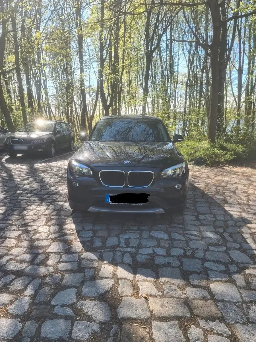 Second-hand BMW X1 150 CP (110 kW) 2012 Negru SUV