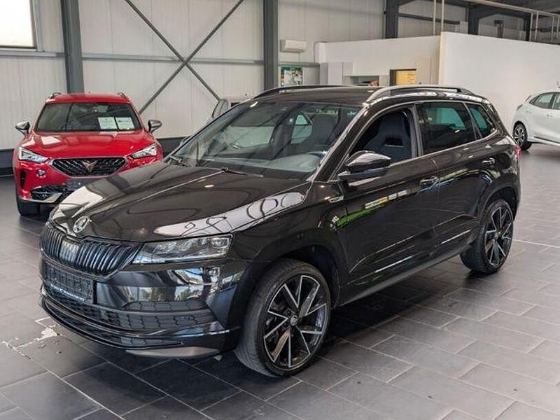 Schwarz Gebraucht 2021 Skoda Karoq SportLine SUV | 25.900 € (Teuer) - Bild 1/4