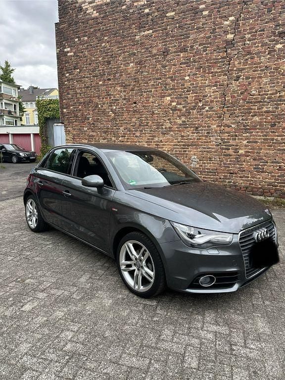 Grau Gebraucht 2014 Audi A1 Sportback S-Line Kleinwagen | 9.790 € (Guter Preis) - Bild 1/4