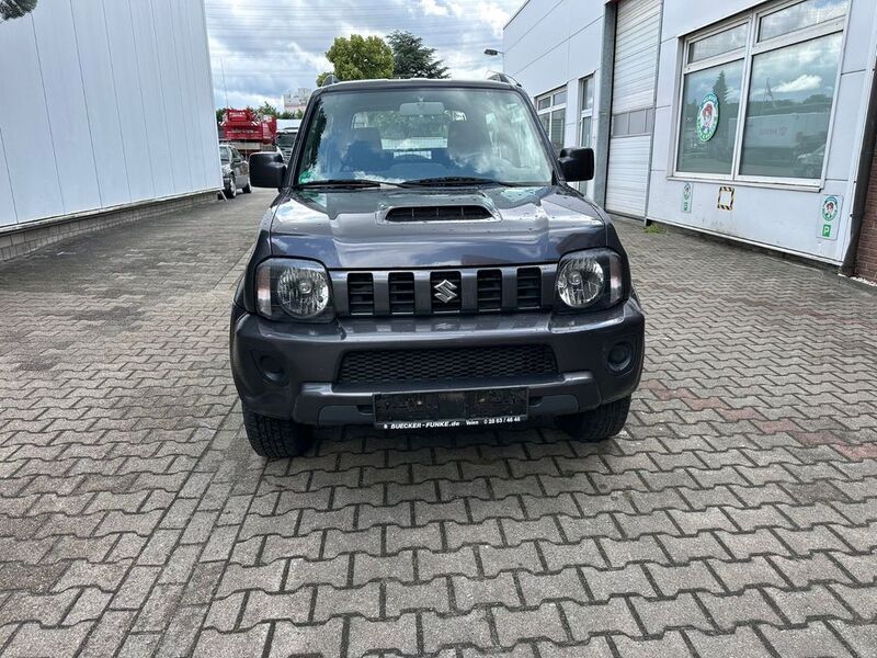 Grau Gebraucht 2016 Suzuki Jimny Comfort SUV | 7.900 € - Bild 1/4