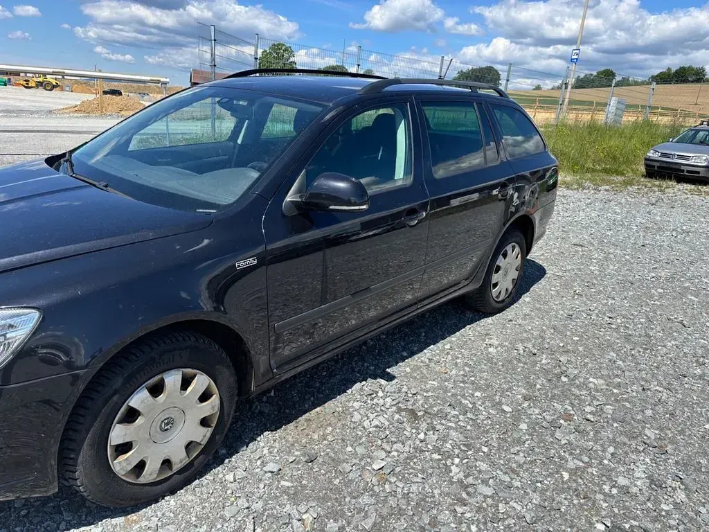 Brugt Skoda Octavia 105 HK (77 kW) 2012 Sort Stationcar