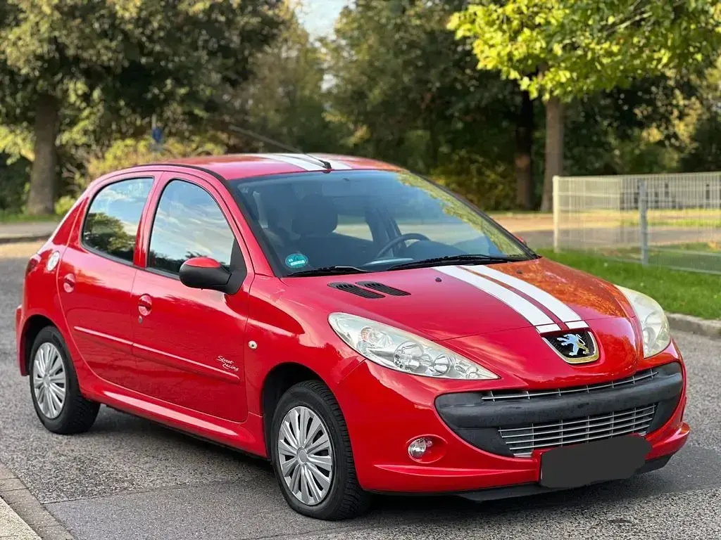 Gebraucht Peugeot 206 Sportium 73 PS (53 kW) 2012 Rot Limousine