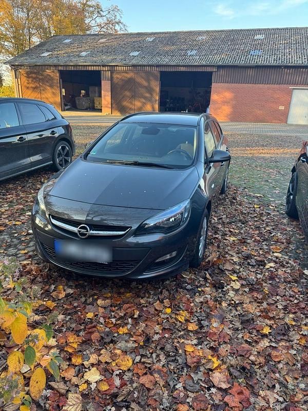 Grau Gebraucht 2014 Opel Astra Eco Kombi | 4.499 € (Guter Preis) - Bild 1/4