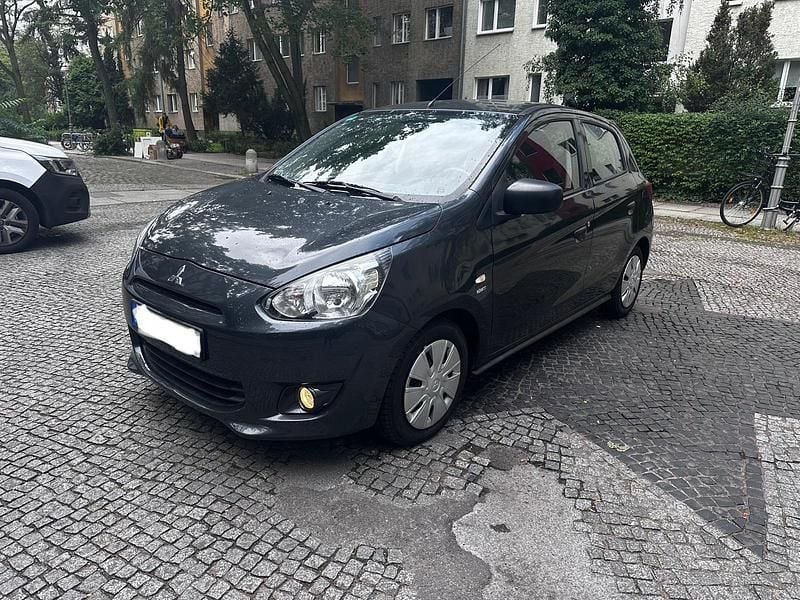 Grau Gebraucht 2014 Mitsubishi Space Star Kleinwagen | 3.350 € - Bild 1/4