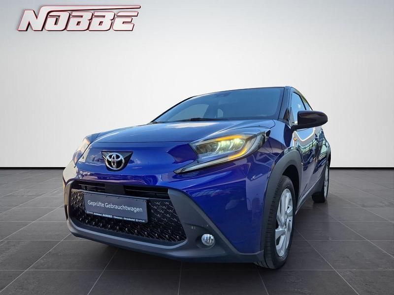 Blau Gebraucht 2022 Toyota Aygo X Pulse SUV | 15.890 € (Fairer Preis) - Bild 1/4