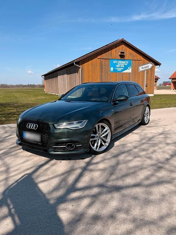 Second-hand Audi A6 Exclusive 320 CP (235 kW) 2018 Verde Break