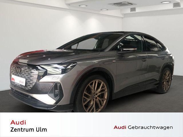 Taifungrau metallic Gebraucht 2022 Audi Q4 Sportback e-tron Ambiente SUV | 34.790 € (Fairer Preis) - Bild 1/4