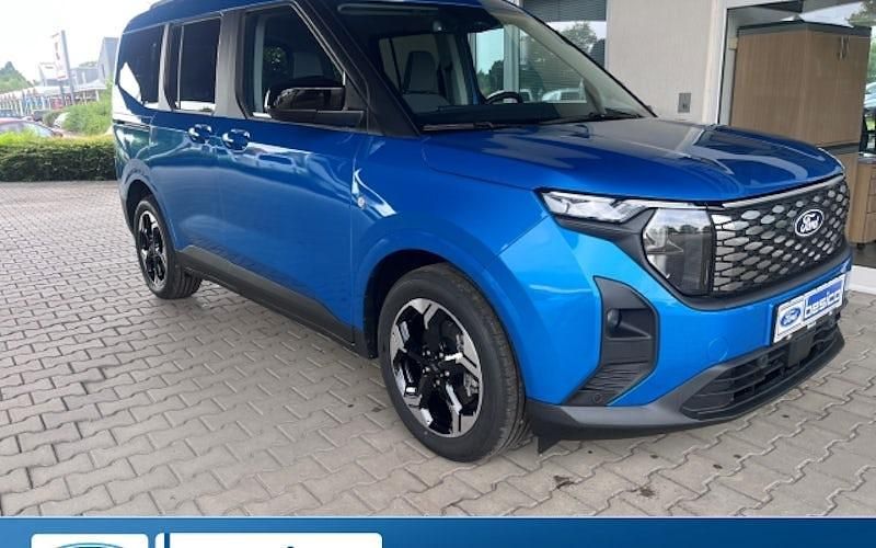 Digital aqua blue metallic (blau) Neu 2025 Ford Tourneo Titanium Van / Kleinbus | 39.342 € (Etwas zu teuer) - Bild 1/4
