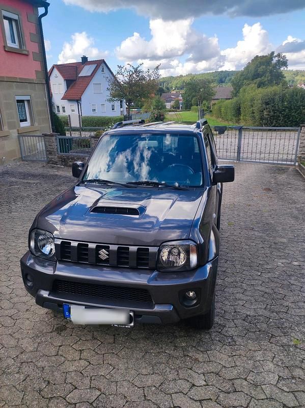 Schwarz Gebraucht 2013 Suzuki Jimny SUV | 15.000 € (Fairer Preis) - Bild 1/4
